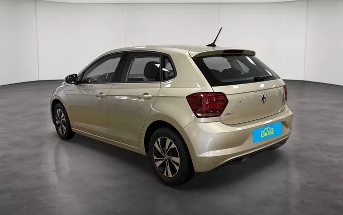 VOLKSWAGEN POLO 1.0 TSI 95 S&S BVM5 Confortline extérieur trois quart arrière gauche 213633