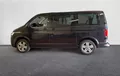 Miniature VOLKSWAGEN UTILITAIRES CARAVELLE 6.1 2.0 TDI 150 BMT Courte DSG7 4Motion Confortline extérieur trois quart arrière gauche 105481