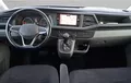 Miniature VOLKSWAGEN UTILITAIRES CARAVELLE 6.1 2.0 TDI 150 BMT Courte DSG7 4Motion 9 Places Confortline extérieur trois quart avant droit 106152