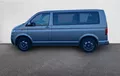 Miniature VOLKSWAGEN UTILITAIRES CARAVELLE 6.1 2.0 TDI 150 BMT Courte DSG7 4Motion 9 Places Confortline extérieur trois quart arrière gauche 106152