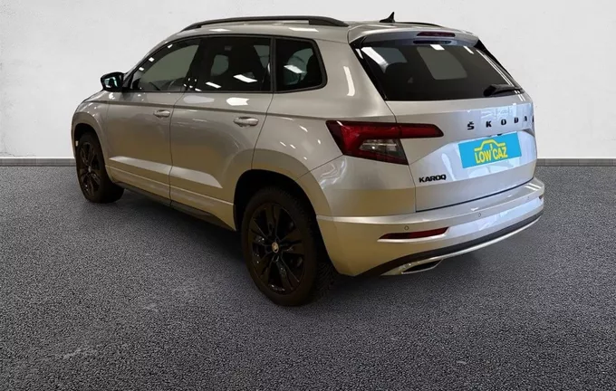 SKODA KAROQ 2.0 TDI 116 ch SCR DSG7 Sportline extérieur trois quart arrière gauche 212969