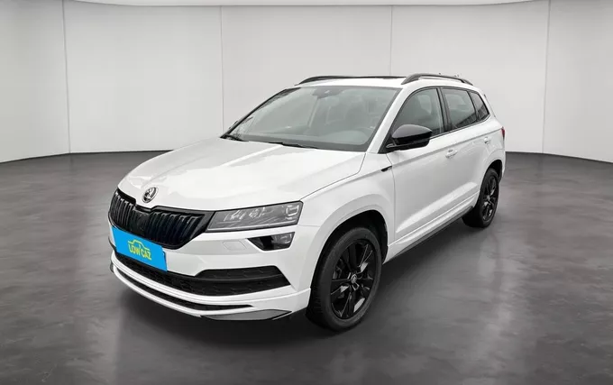 SKODA KAROQ 1.5 TSI 150 ch ACT DSG7 Sportline extérieur trois quart avant gauche 213699