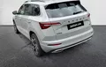 Miniature SKODA KAROQ 2.0 TDI 150 ch SCR DSG7 4x4 Sportline extérieur trois quart arrière gauche 4648