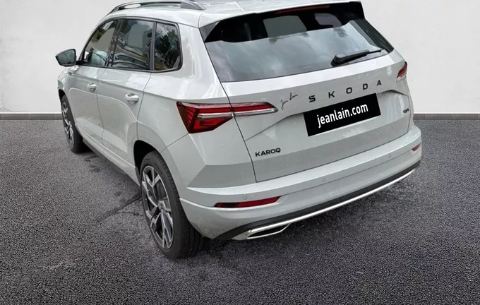 SKODA KAROQ 2.0 TDI 150 ch SCR DSG7 4x4 Sportline extérieur trois quart arrière gauche 4648