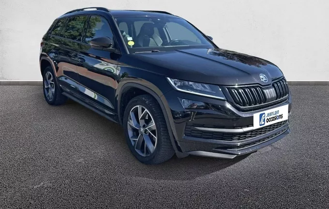 SKODA KODIAQ 2.0 TDI 200 SCR DSG7 4x4 7pl Sportline extérieur trois quart avant droit 560803