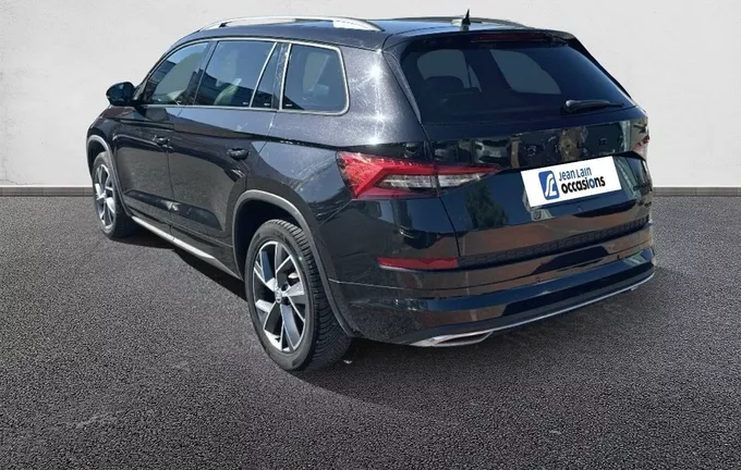 SKODA KODIAQ 2.0 TDI 200 SCR DSG7 4x4 7pl Sportline extérieur trois quart arrière gauche 560803