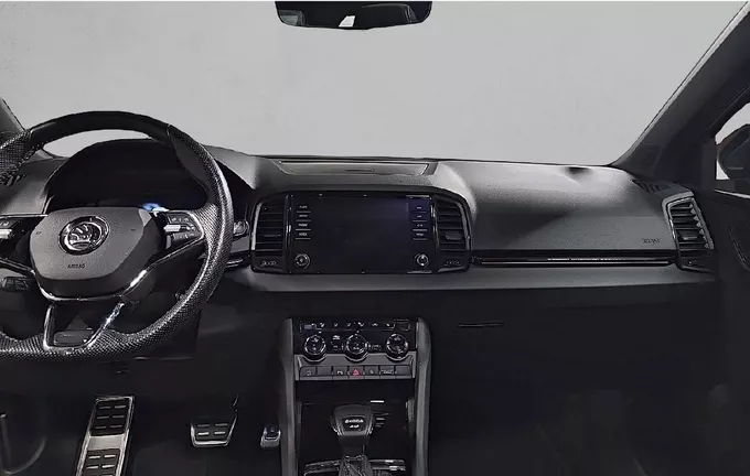 SKODA KAROQ 2.0 TDI 150 ch SCR DSG74x4 Sportline extérieur trois quart avant droit 2129033