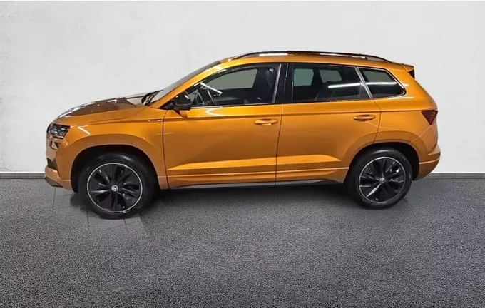 SKODA KAROQ 2.0 TDI 150 ch SCR DSG74x4 Sportline extérieur trois quart arrière gauche 2129033