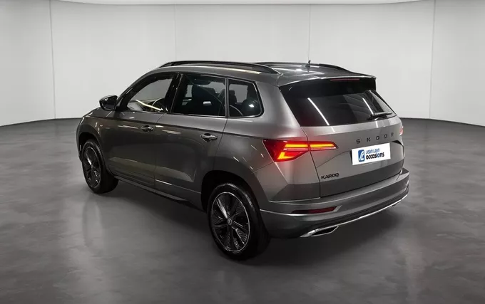 SKODA KAROQ 1.5 TSI Evo 2 150 ch ACT DSG7 Sportline extérieur trois quart arrière gauche 2132424