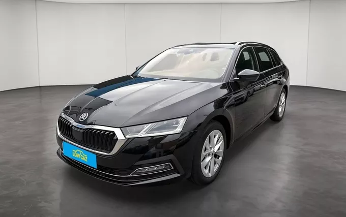 SKODA OCTAVIA Combi 2.0 TDI 150 ch DSG7 4x4 Style extérieur trois quart avant gauche 213758