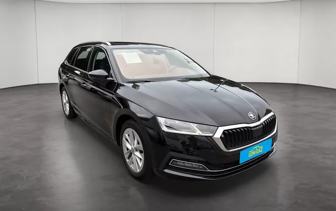 SKODA OCTAVIA Combi 2.0 TDI 150 ch DSG7 4x4 Style extérieur trois quart avant droit 213758
