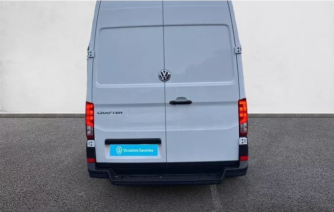 VOLKSWAGEN UTILITAIRES CRAFTER VAN 35 L3H3 2.0 TDI 140 CH BVA BUSINESS extérieur trois quart arrière gauche 106198