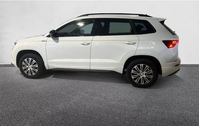 SKODA KAROQ 1.5 TSI 150 ch ACT DSG7 Sportline extérieur trois quart arrière gauche 2130604