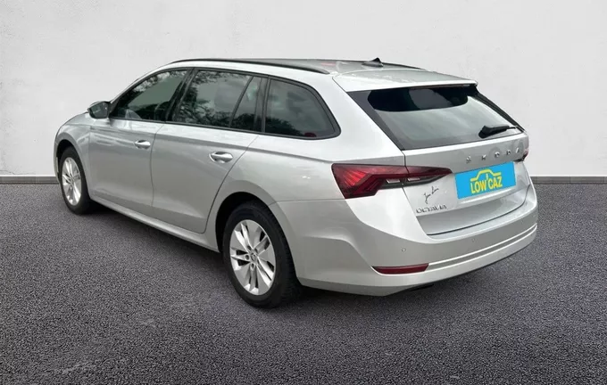SKODA OCTAVIA Combi 2.0 TDI 150 ch DSG7 Business extérieur trois quart arrière gauche 212961