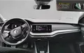 Miniature SKODA OCTAVIA Combi 2.0 TDI 150 ch DSG7 Ambition extérieur trois quart avant droit 