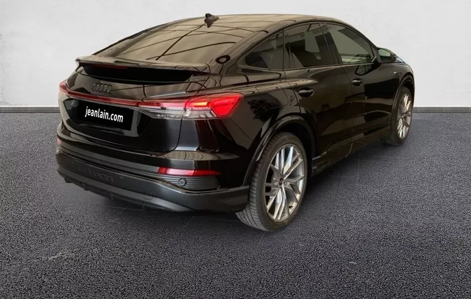 AUDI Q4 E-TRON Sportback 45 285 ch 82 kWh extérieur trois quart arrière droit 9576