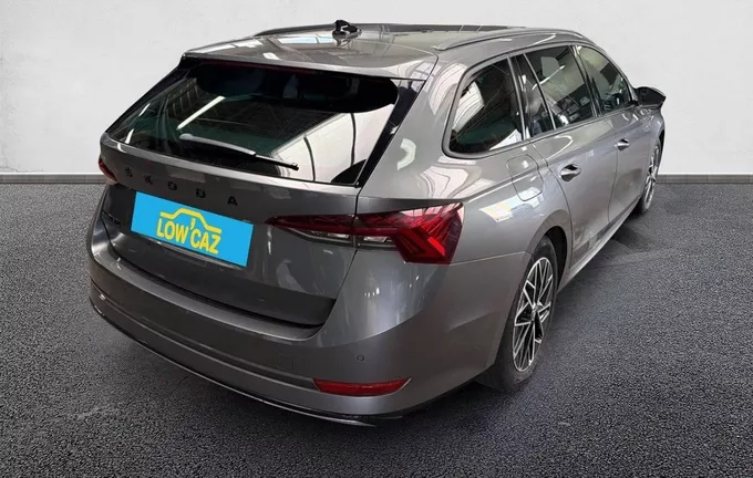 SKODA OCTAVIA Combi 1.5 TSI mHEV e-TEC 150 ch ACT DSG7 Sportline extérieur trois quart arrière droit 213227