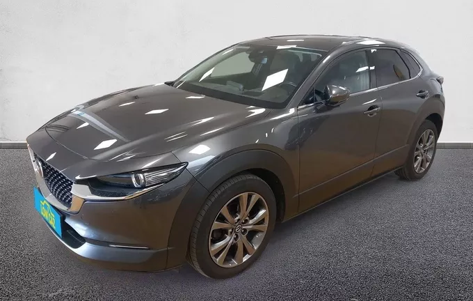MAZDA CX-30 2.0L e-SKYACTIV X M Hybrid 186 ch 4x2 BVA6 Exclusive extérieur trois quart avant gauche 213077