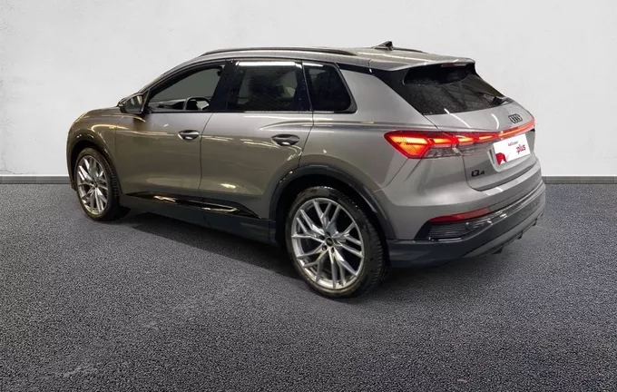 AUDI Q4 E-TRON 45 285 ch 82 kWh extérieur trois quart arrière gauche 2125511