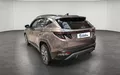 Miniature HYUNDAI TUCSON 1.6 T-GDI 230 Hybrid BVA6 Executive extérieur trois quart arrière gauche 14082