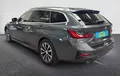 Miniature BMW SERIE 3 Touring 318d 150 ch BVA8 Lounge extérieur trois quart arrière gauche 213007