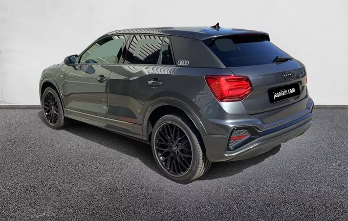 AUDI Q2 35 TFSI 150 S tronic 7 S line extérieur trois quart arrière gauche 8575