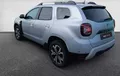 Miniature DACIA DUSTER Blue dCi 115 4x2 Prestige extérieur trois quart arrière gauche 2125727