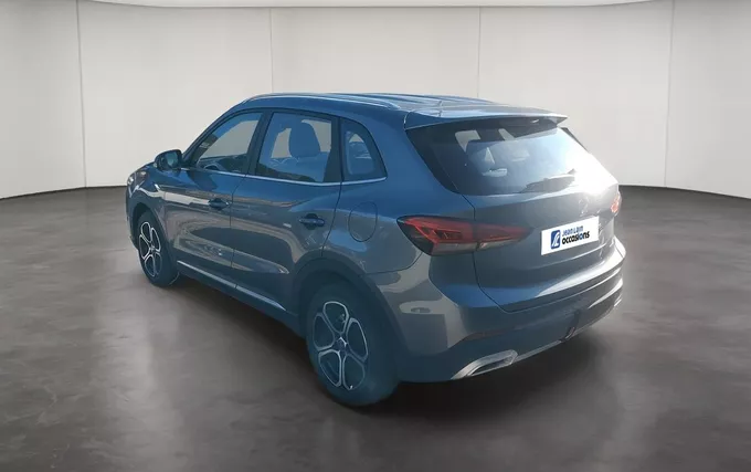MG ZS 1.5 L Hybrid+ 197 ch Comfort extérieur trois quart arrière gauche 601350