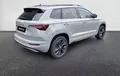 Miniature SKODA KAROQ 1.5 TSI Evo 2 150 ch ACT DSG7 Sportline extérieur trois quart arrière droit 3013