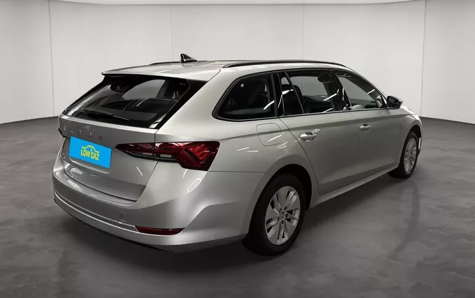 SKODA OCTAVIA Combi 2.0 TDI 150 ch DSG7 Business extérieur trois quart arrière droit 213744