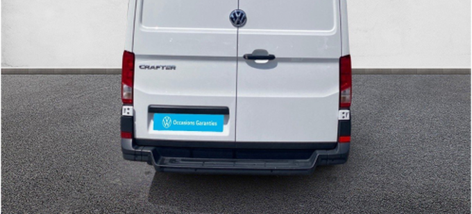 VOLKSWAGEN UTILITAIRES CRAFTER VAN 35 L3H3 2.0 TDI 140 CH BVA BUSINESS extérieur trois quart arrière gauche 