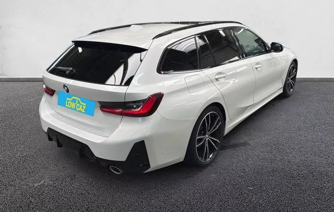 BMW SERIE 3 Touring 320d xDrive 190 ch BVA8 M Sport extérieur trois quart arrière droit 3014260