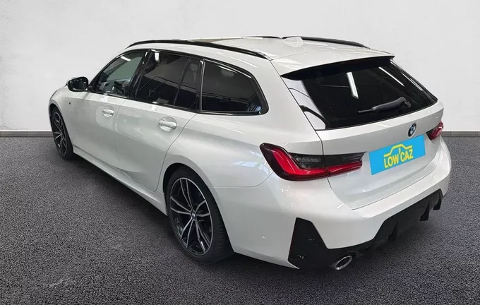 BMW SERIE 3 Touring 320d xDrive 190 ch BVA8 M Sport extérieur trois quart arrière gauche 3014260