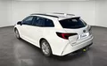 Miniature TOYOTA COROLLA Touring Sports Hybride 140ch Dynamic extérieur trois quart arrière gauche 1104102