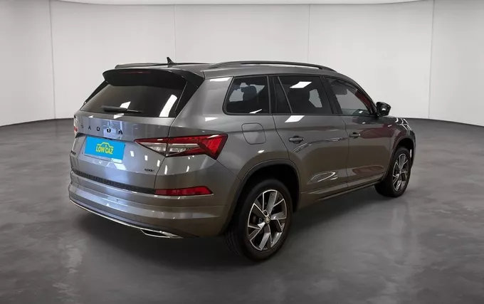 SKODA KODIAQ 2.0 TDI 200 SCR DSG7 4x4 5pl Sportline extérieur trois quart arrière droit 213644