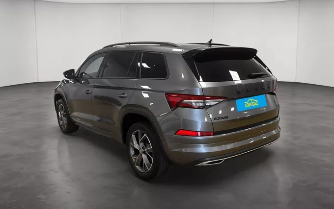 SKODA KODIAQ 2.0 TDI 200 SCR DSG7 4x4 5pl Sportline extérieur trois quart arrière gauche 213644