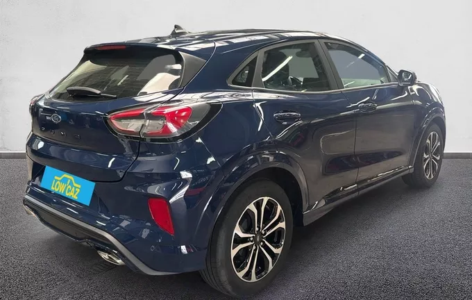 FORD PUMA 1.0 Flexifuel 125 ch mHEV S&S BVM6 ST-Line extérieur trois quart arrière droit 213416