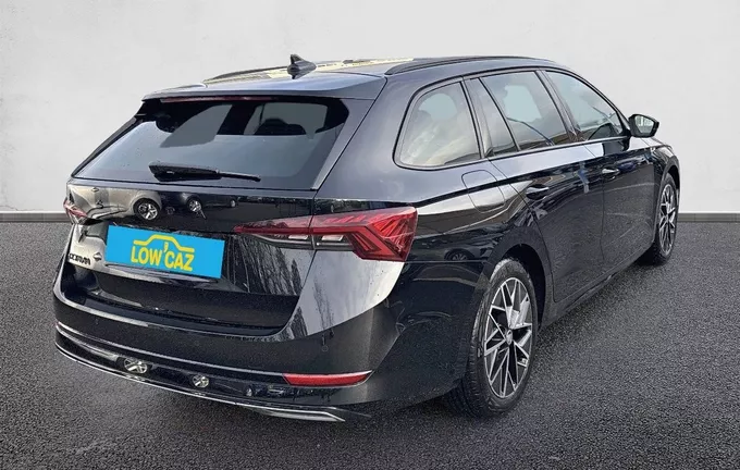 SKODA OCTAVIA Combi 1.5 TSI mHEV e-TEC 150 ch ACT DSG7 Sportline extérieur trois quart arrière droit 212700