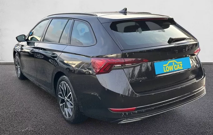 SKODA OCTAVIA Combi 1.5 TSI mHEV e-TEC 150 ch ACT DSG7 Sportline extérieur trois quart arrière gauche 212700