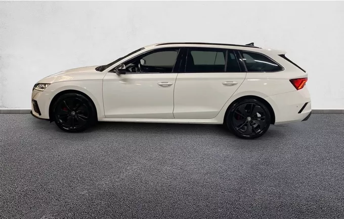 SKODA OCTAVIA Combi 2.0 TDI 200 ch DSG7 RS extérieur trois quart arrière gauche 2129340