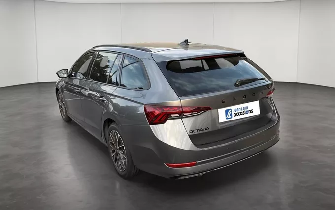 SKODA OCTAVIA Combi 2.0 TDI 150 ch DSG7 Sportline extérieur trois quart arrière gauche 2132188