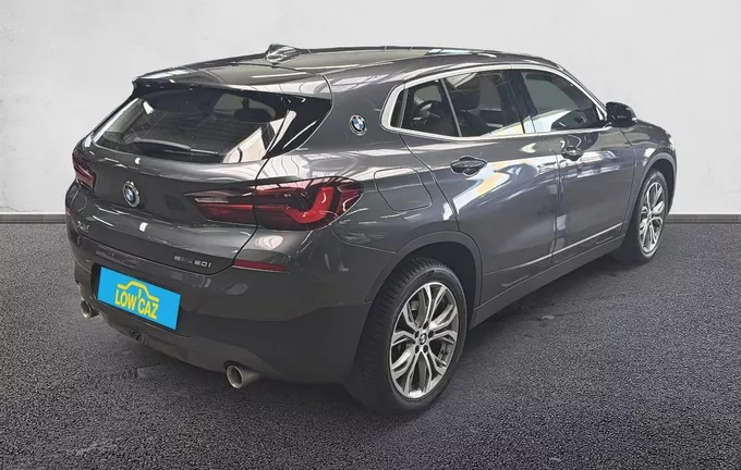 BMW X2 sDrive 20i 178 ch DKG7 Business Design extérieur trois quart arrière droit 213005