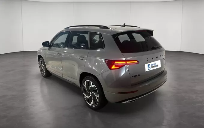 SKODA KAROQ 2.0 TDI 150 ch SCR DSG7 4x4 Sportline extérieur trois quart arrière gauche 2131890