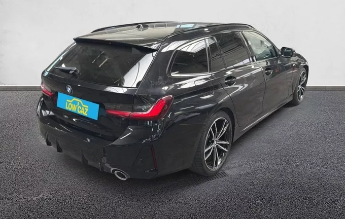 BMW SERIE 3 Touring 320d xDrive 190 ch BVA8 M Sport extérieur trois quart arrière droit 3014259