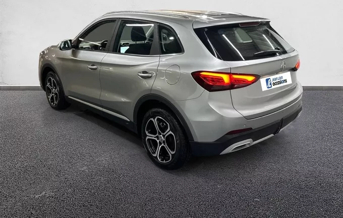 MG ZS 1.5 L Hybrid+ 197 ch Comfort extérieur trois quart arrière gauche 601174