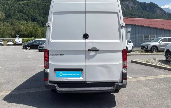 VOLKSWAGEN UTILITAIRES CRAFTER VAN 35 L3H3 2.0 TDI 140 CH BVA BUSINESS extérieur côté gauche 106240