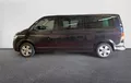 Miniature VOLKSWAGEN UTILITAIRES CARAVELLE 6.1 2.0 TDI 204 BMT Longue DSG7 4Motion Confortline extérieur trois quart arrière gauche 105480