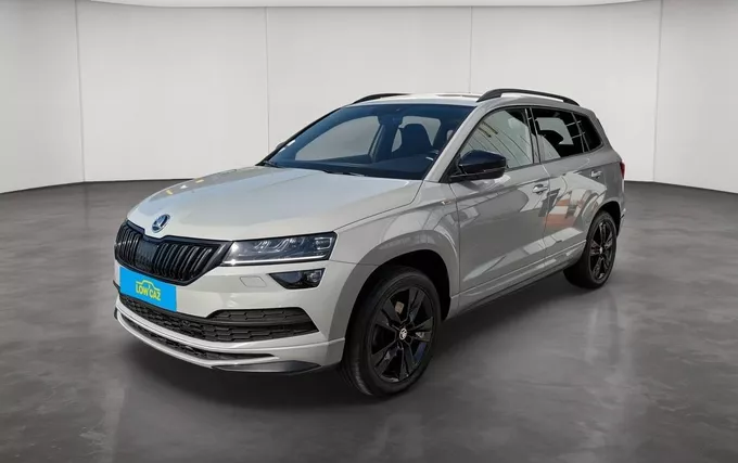 SKODA KAROQ 2.0 TDI 150 ch SCR 4x4 DSG7 Sportline extérieur trois quart avant gauche 2130139