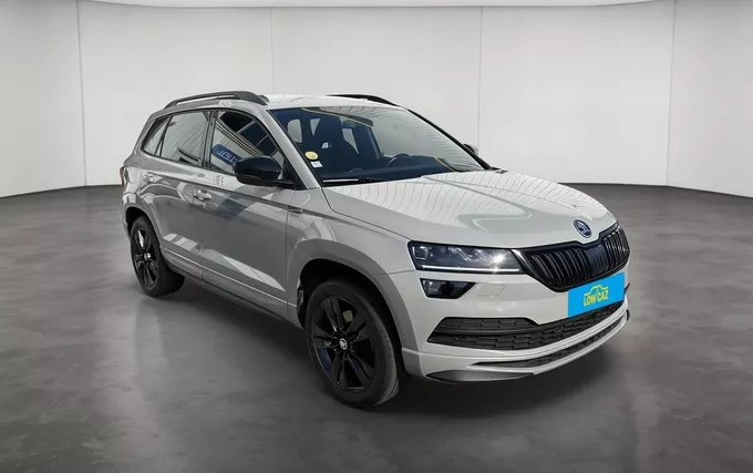 SKODA KAROQ 2.0 TDI 150 ch SCR 4x4 DSG7 Sportline extérieur trois quart avant droit 2130139