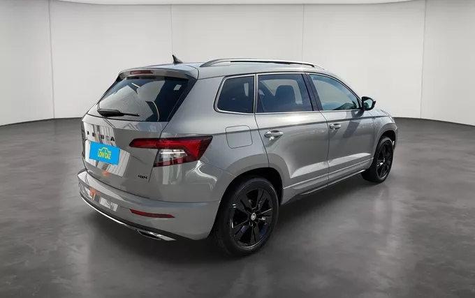 SKODA KAROQ 2.0 TDI 150 ch SCR 4x4 DSG7 Sportline extérieur trois quart arrière droit 2130139